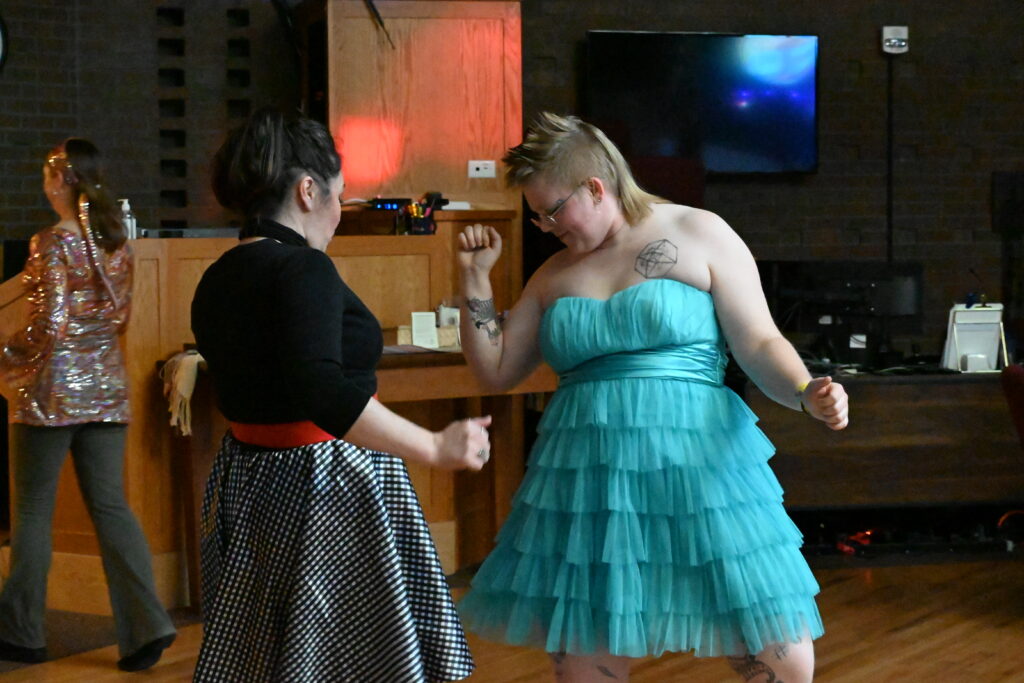 Two Common Flame members share a dance together at our 2026 Spring Dance.
